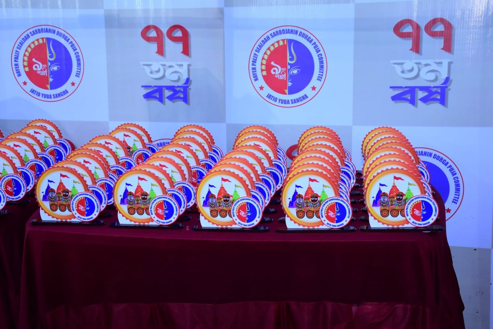 Rows of commemorative plaques for Nayer Pally Sealdah Sarbojanin Durga Puja Committee 77th year